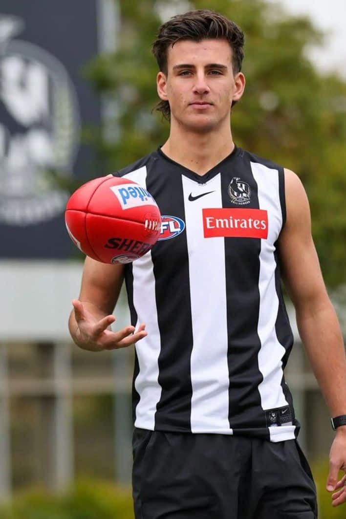 Nick-Daicos-after-signing-with-Collingwood-for-four-years.jpeg