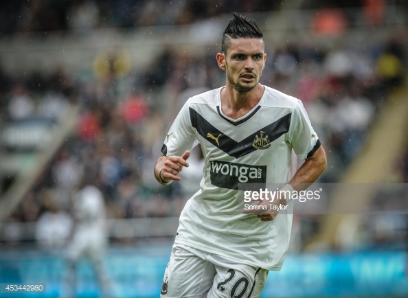 453442980-remy-cabella-of-newcastle-runs-during-the-gettyimages.jpg