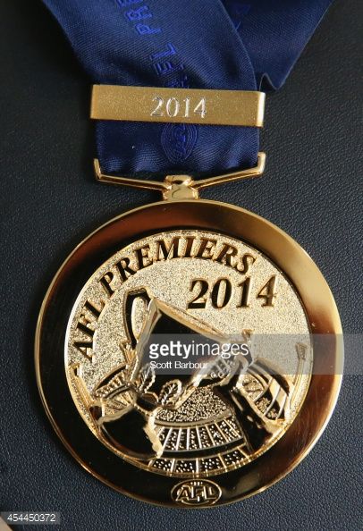 454450372-an-afl-premiers-2014-medal-on-display-during-gettyimages.jpg