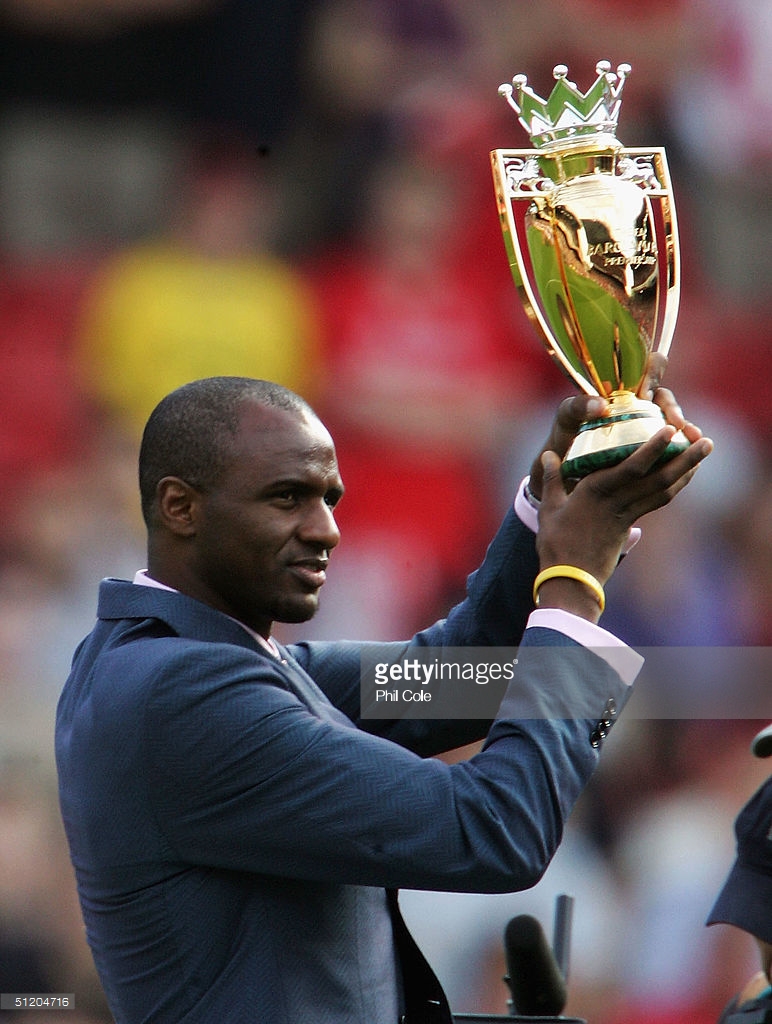 51204716-patrick-vieira-holds-up-a-specially-gettyimages.jpg