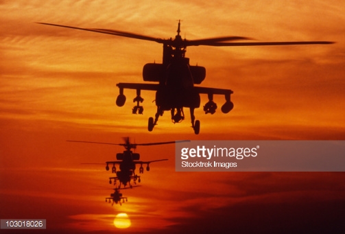 103018026-four-ah-64-apache-anti-armor-helicopters-fly-gettyimages.jpg