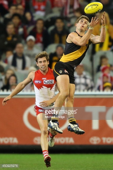 450925976-anthony-miles-of-the-tigers-marks-the-ball-gettyimages.jpg