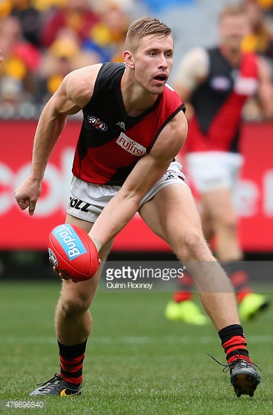 478696840-shaun-mckernan-of-the-bombers-handballs-gettyimages.jpg