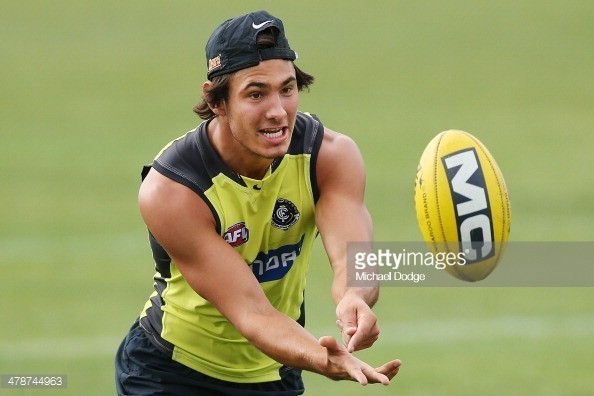 478744963-troy-menzel-handpasses-the-ball-during-a-gettyimages.jpg