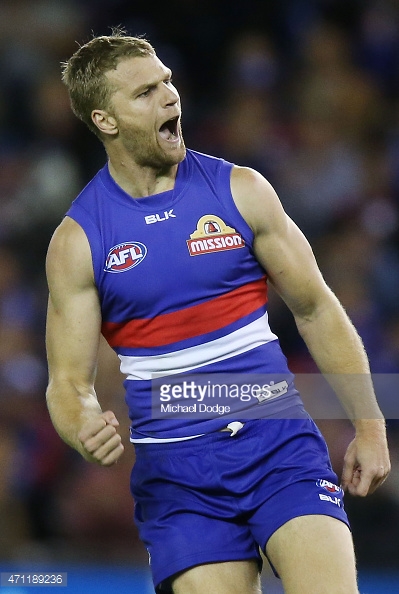 471189236-jake-stringer-of-the-bulldogs-celebrates-a-gettyimages.jpg