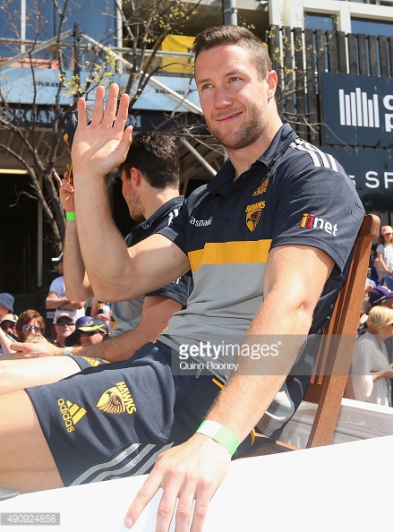 490924858-james-frawley-of-the-hawks-waves-to-the-gettyimages.jpg