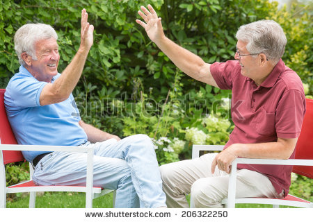 stock-photo-two-elderly-men-are-sitting-opposite-and-are-having-so-much-fun-they-high-five-each-other-206322250.jpg