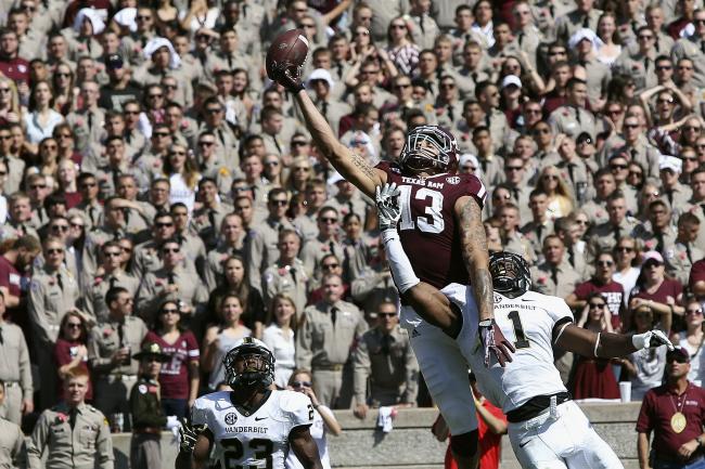 hi-res-185942967-mike-evans-of-the-texas-a-m-aggies-has-the-ball-go-off_crop_exact.jpg