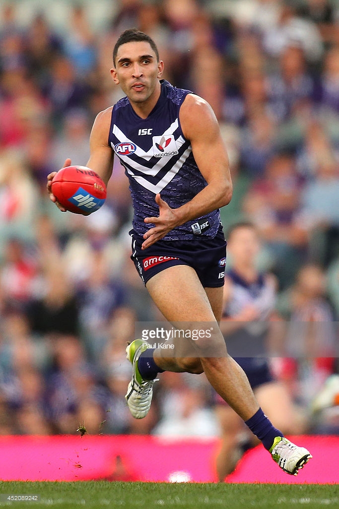 anthony-morabito-of-the-dockers-runs-with-the-ball-during-the-round-picture-id452089242