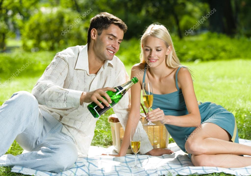 depositphotos_6305404-Young-happy-couple-celebrating-with-champagne-at-picnic.jpg