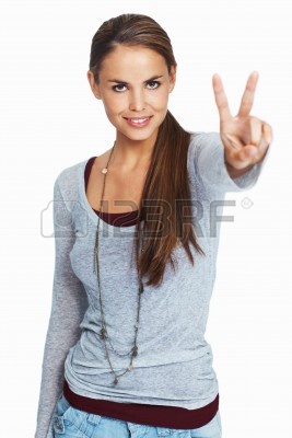 11014838-portrait-of-beautiful-young-woman-showing-peace-sign-on-white-background.jpg