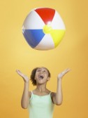 16095234-african-girl-playing-with-beach-ball.jpg