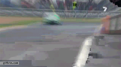 1341421938_race_driver_keeps_control_of_car_after_spinning.gif