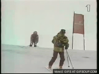 slalom-skier-crashed-into-official-winter-sports-fails.gif