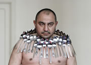 112695-1b_most_spoons_on_a_human_body_Etibar_Elchyev.jpg