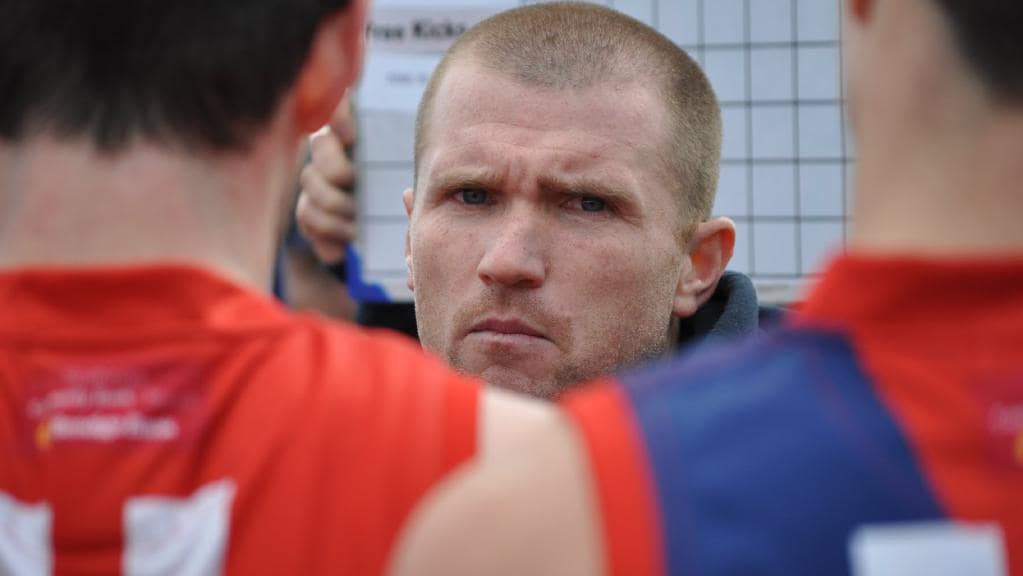 Coburg coach Leigh Adams addresses his players. Picture: Daniel Atamian