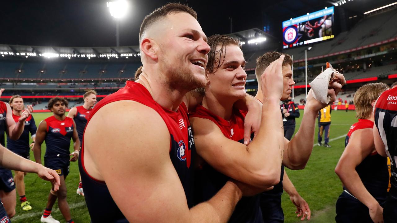 Steven May celebrates a win with teammate Trent Rivers. Picture: AFL Photos/Getty Images