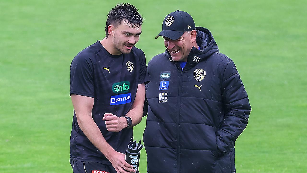 Richmond coach [PLAYERCARD]Adem Yze[/PLAYERCARD] shares a laugh with Josh Gibcus, who has been battling hamstring issues. Picture: Ian Currie