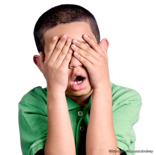 istock_nicolesy-6-boy-hiding-his-eyes-behind-his-hands-frustrated-c.jpg