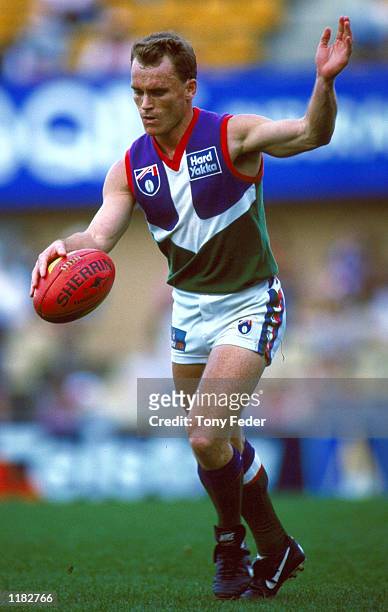 peter-miller-of-fremantle-in-action-in-the-match-between-the-sydney-swans-and-the-fremantle.jpg