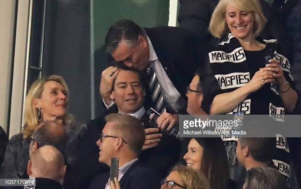 eddie-mcguire-kisses-gillon-mclachlan-chief-executive-officer-of-the-picture-id1037170076