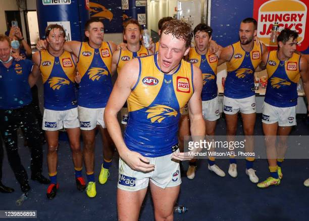 hugh-dixon-of-the-eagles-sings-the-team-song-during-the-2022-afl-04-picture-id1239856893