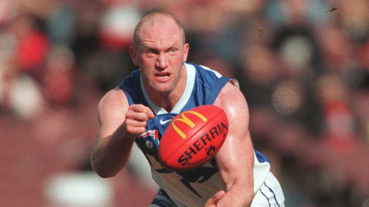 Mick Martyn in action for North Melbourne in 1999.