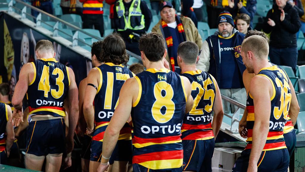 Adelaide Crows players walk from the ground during the round 7 match against St Kilda at Adelaide Oval on Monday night. Picture: Daniel Kalisz/Getty Images