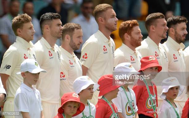 joe-root-of-england-and-his-teammates-line-up-for-the-national-the-picture-id877602632