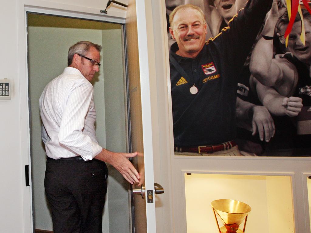 Adelaide Football Club chief executive Steven Trigg retreats to his office after speaking to members of the media at AAMI Stadium the day after the AFL Commission hearing over the [PLAYERCARD]Kurt Tippett[/PLAYERCARD] saga.