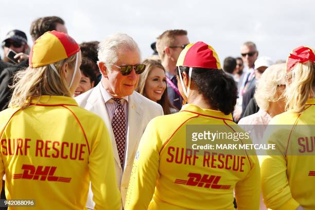 britains-prince-charles-talks-to-surf-lifesavers-on-broadbeach-in-gold-coast-on-april-5-the.jpg