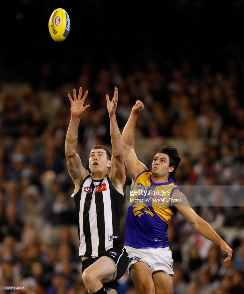 mason-cox-of-the-magpies-and-tom-barrass-of-the-eagles-in-action-the-picture-id1135204335