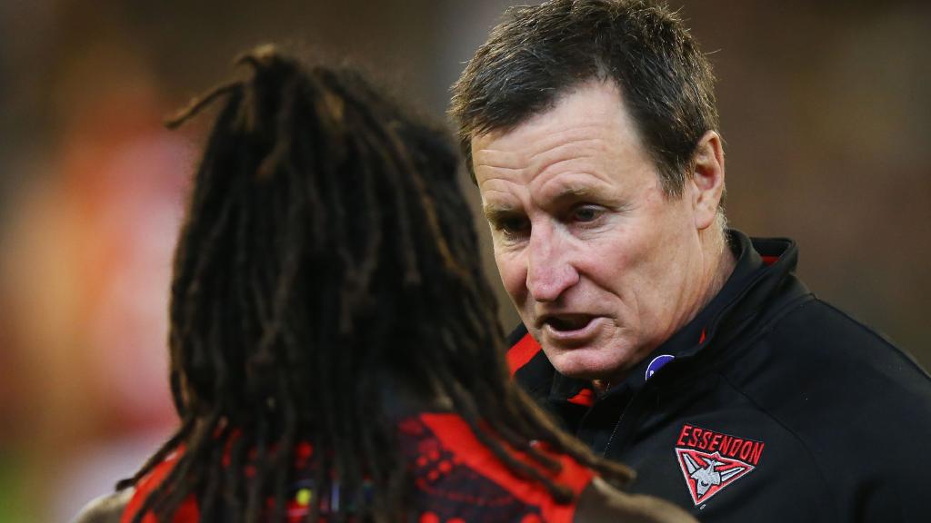 McDonald-Tipungwuti with Essendon coach John Worsfold. Picture: Getty Images