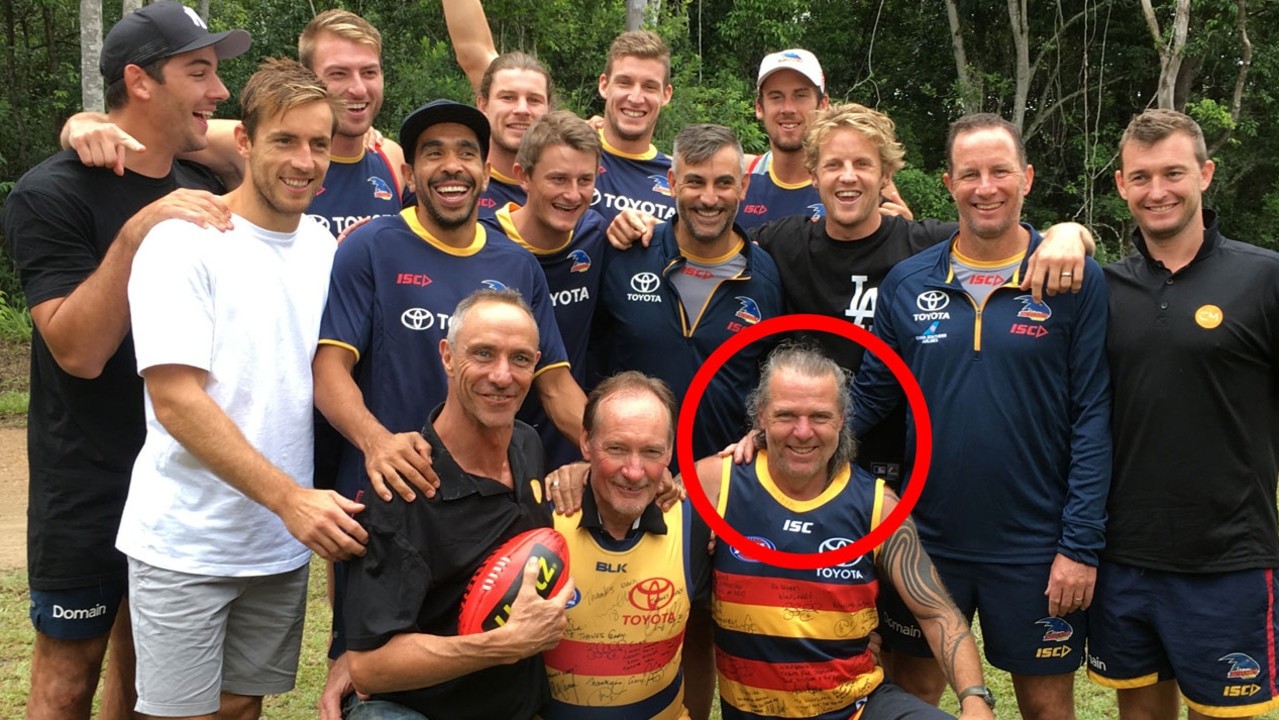 Wolfgang Raven Wildgrace, bottom right, with fellow facilitators Max Witsenhuysen and Gary Simpson, and Crows players at the 2018 pre-season camp. Picture: Supplied