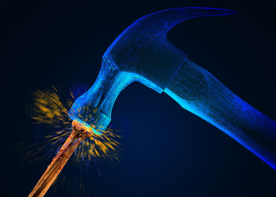 bigstockphoto_hammer_striking_nail_w_sparks_333329.jpg