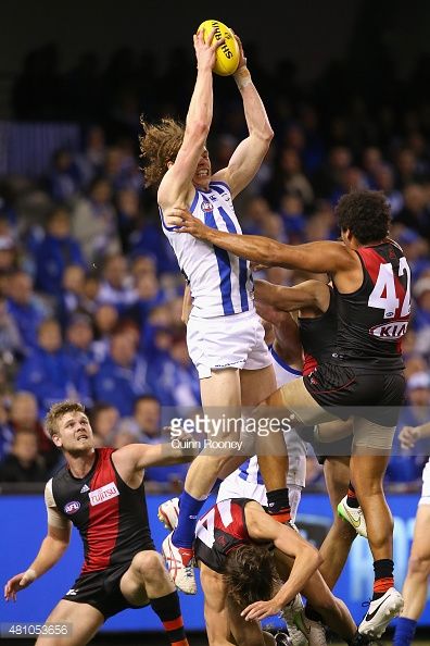 481053656-ben-brown-of-the-kangaroos-marks-over-the-gettyimages.jpg