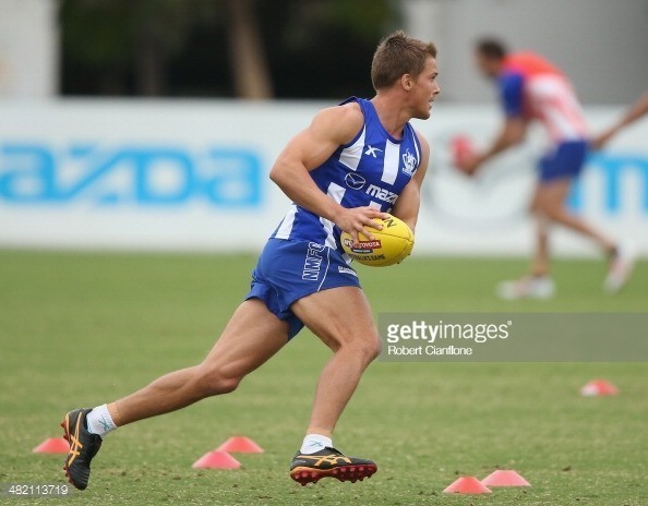 482113719-andrew-swallow-of-the-kangaroos-runs-with-gettyimages.jpg