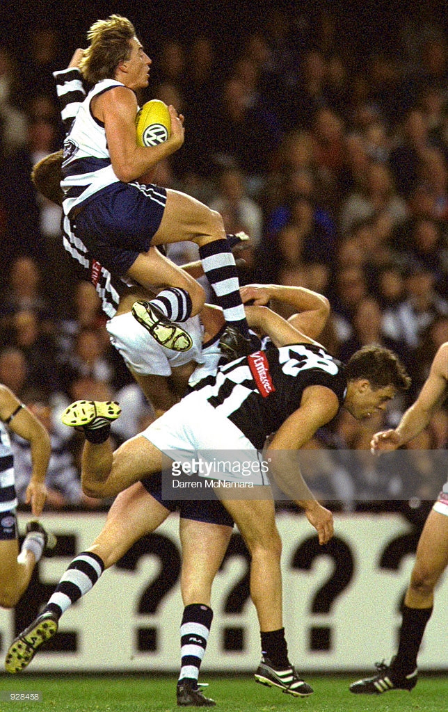 928458-jul-2001-clint-bizzell-of-geelong-takes-a-mark-gettyimages.jpg