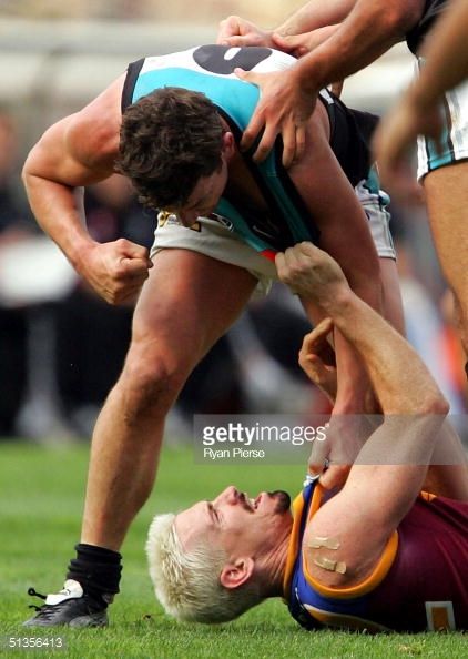 51356413-jason-akermanis-for-the-lions-clashes-with-gettyimages.jpg