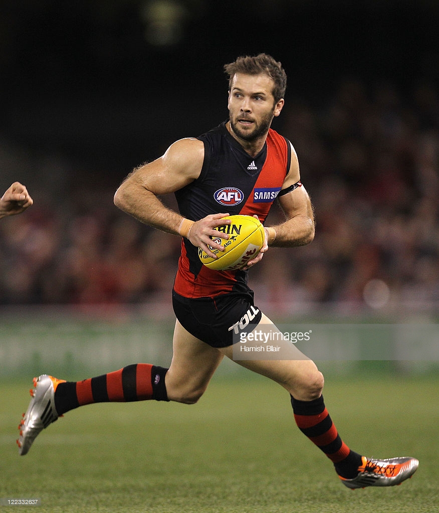 122332637-mark-mcveigh-of-the-bombers-in-action-during-gettyimages.jpg