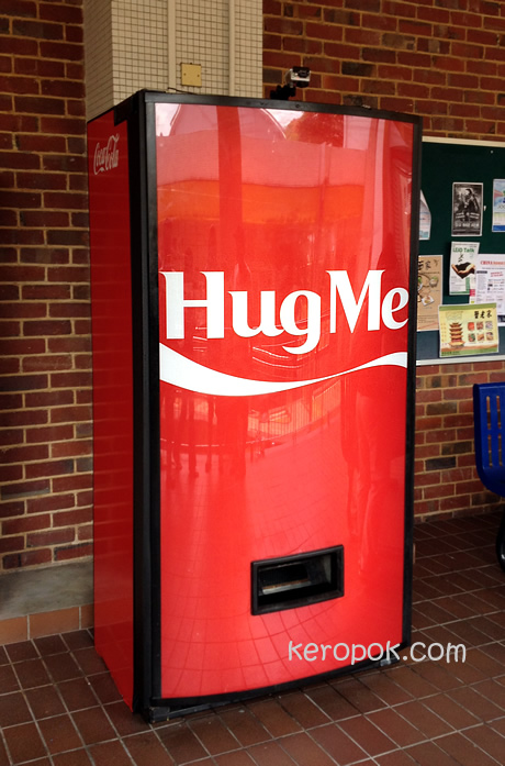 Hug Me Coke Machine