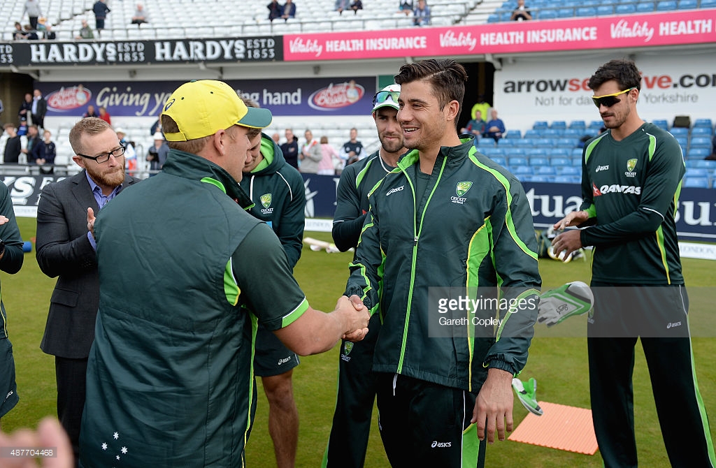 aaron-finch-presents-marcus-stoinis-of-australia-with-his-first-odi-picture-id487704468