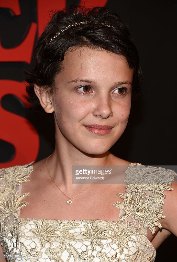 actress-millie-bobby-brown-arrives-at-the-premiere-of-netflixs-at-picture-id546344168