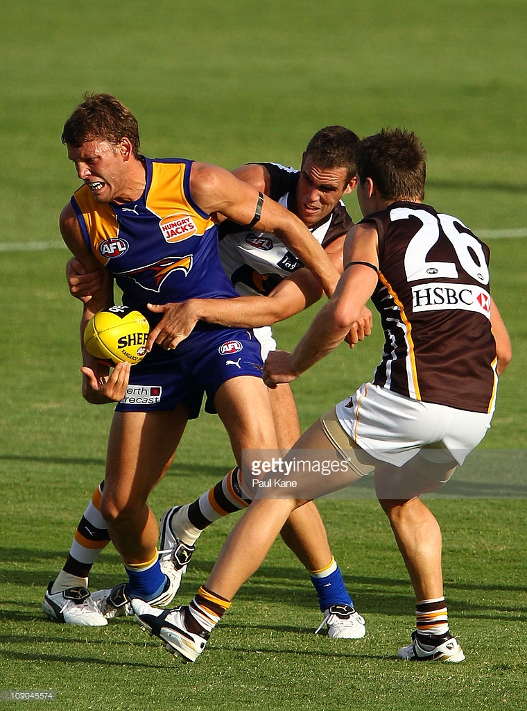 brad-ebert-of-the-eagles-gets-tackled-by-riley-milne-and-liam-shiels-picture-id109045574