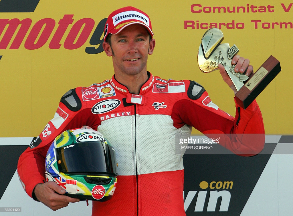 cheste-spain-australias-troy-bayliss-celebrates-after-winning-the-picture-id72294420
