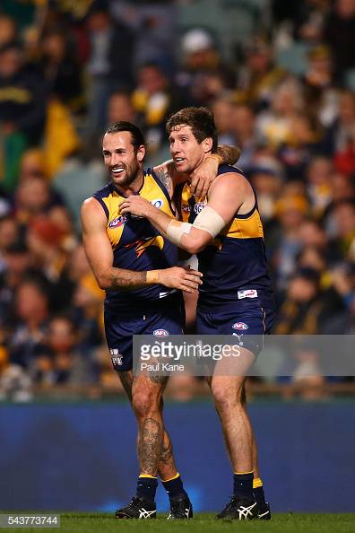 chris-masten-and-patrick-mcginnity-of-the-eagles-celebrate-a-goal-picture-id543773744