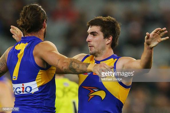 chris-masten-of-the-eagles-and-andrew-gaff-celebrate-a-goal-during-picture-id584678792