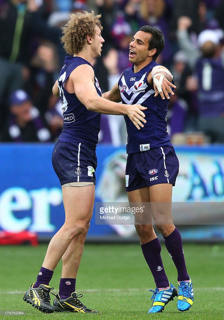 chris-mayne-and-danyle-pearce-of-the-dockers-celebrate-a-goal-during-picture-id179782364