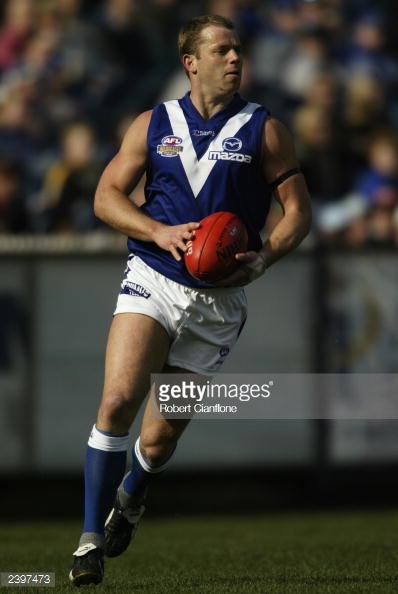 glenn-archer-of-the-kangaroos-in-action-during-the-round-19-afl-match-picture-id2397473