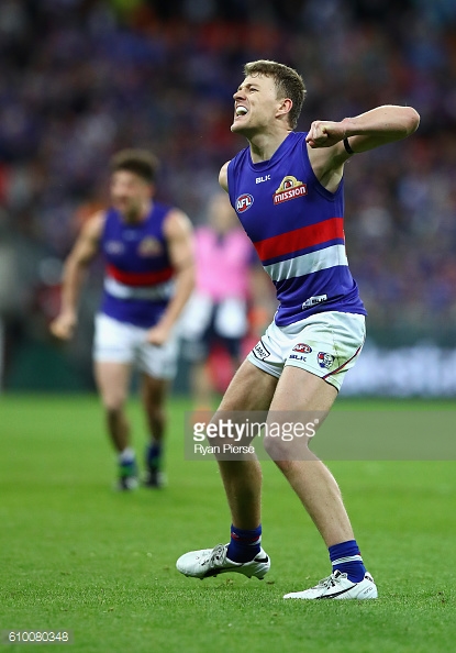 jackson-macrae-of-the-bulldogs-celebrates-after-he-kicked-the-winning-picture-id610080348